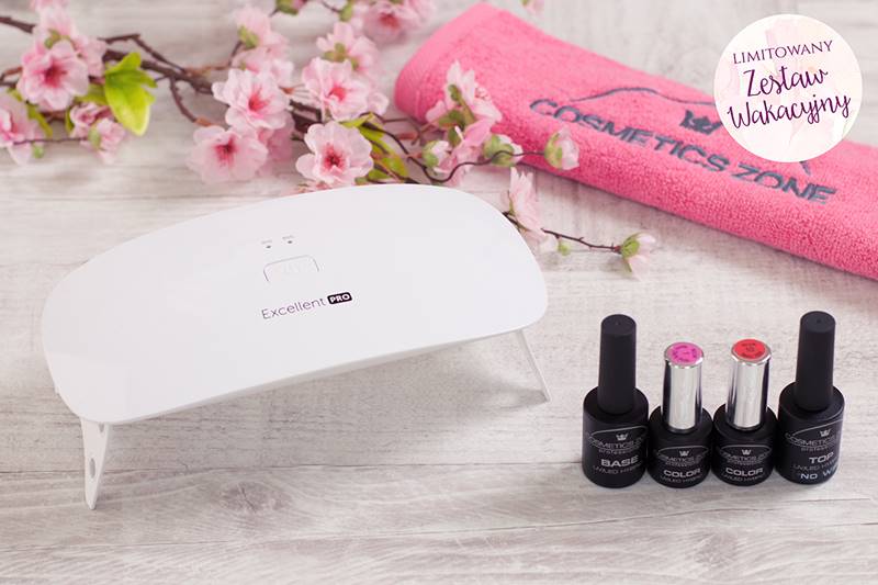butelki z lakierami hybrydowymi i lampa do manicure